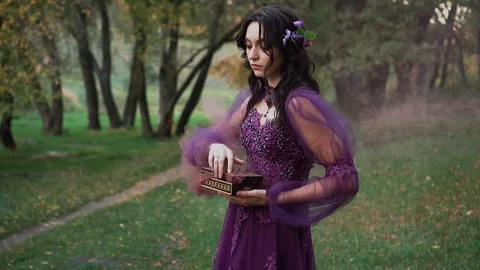 Forest elf releases horrible and evil spirits to freedom from a cramped and Stock Footage 104771236