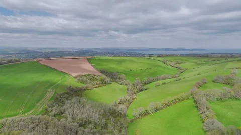 Forest, Farms and fields over Long Wood, River Dart, Dartmouth, Kingswear, Devon Stock-Footage 273564692