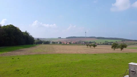 Forest fields and a German town in the distance 動画素材 171389755