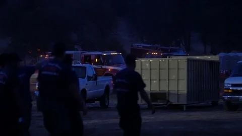 Forest Fire Base Camp Arrival Night Stock Footage 74276790