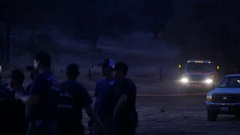 Forest Fire Base Camp Arrival Night Stock Footage 74276791