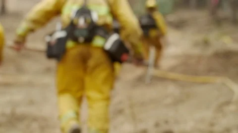 Forest Fire Firefighter Hike Hose Link Slow Motion HERO WALK Stock Footage 74278962