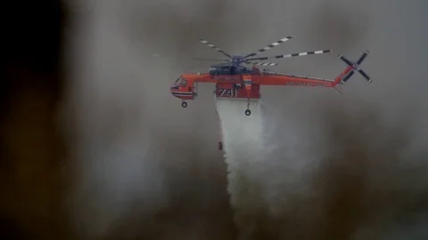 Forest Fire Helicopter Drops Water Close Up Slow Motion Stockbeeldmateriaal 74275731