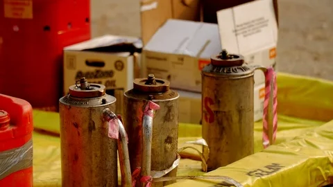 Forest Fire Hoses and Fuel Cans Stockbeeldmateriaal 74275928