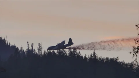 Forest Fire Large Air Tanker Retardant Drop Slow Motion Stock Footage 74275316