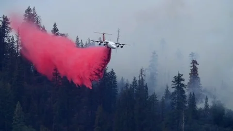 Forest Fire Large Air Tanker Retardant Drop Slow Motion Stock Footage
