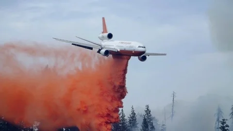 Forest Fire Large Air Tanker EPIC SLOW MOTION Fire Retardant Drop Stock Footage 74314679