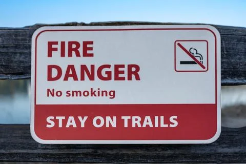 Forest fire warning sign board. Extreme Fire Danger Sign in the park. Stock Photos