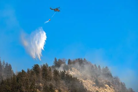 Forest fires affect areas of Mesocco in Southern Switzerland, Switzerland - 28 D Stock Photos