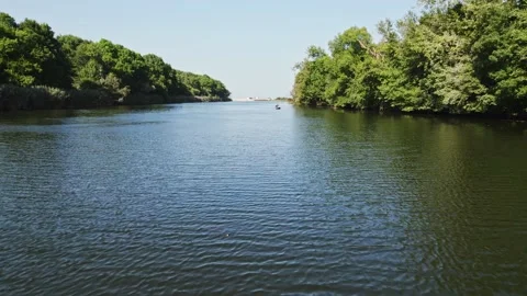 Forest FPV Fly Along River Rise to Reval Beach Bar and Sea Canoes Tourists Hot Stock Footage 235664518