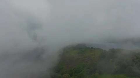 Forest Hill Through Mist and Coulds Aerial Shot Athirapally Stock Footage 112365700