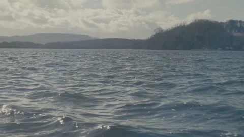 Forest Island and Mountain Backdrop with Rugged Irish Lough in the Foreground Stock Footage 236159384