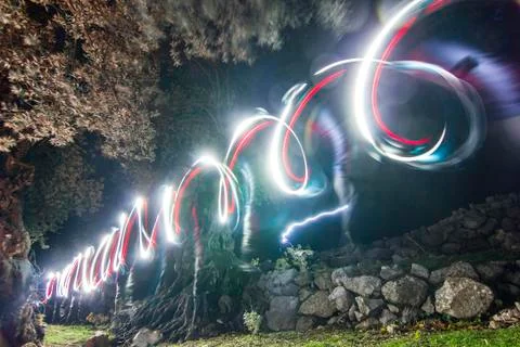 Forest with light rolling at night Foto stock