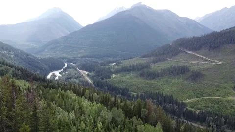 Forest Mountain Valley &amp; Lake Down to Trees Drone Short Clip 4k Stock Footage 248906028