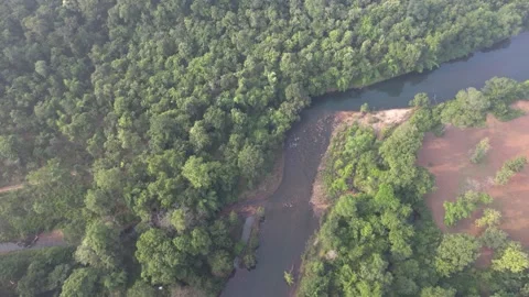 Forest mountains road and river areal drone shot 4k 30p Stock Footage 231334725