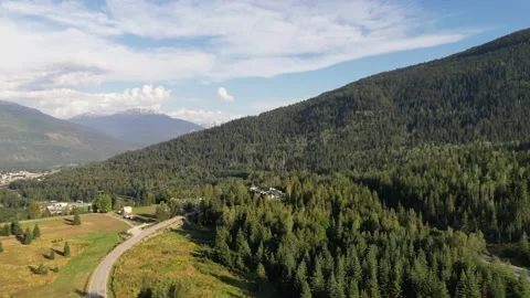 Forest in the Mountains to Village Pan Stock Footage 219767083