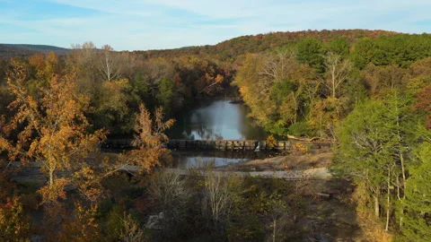 Forest River Beside Autumn Trees in Natural Dam, Arkansas Video stock 333202390