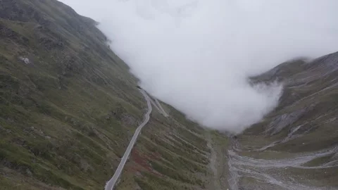 Forest Road Top View r Moving Up The Alps Aerial Footage Stockbeeldmateriaal 252151819