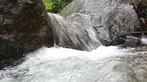Forest Stream Waterfall Flow Over Rocks | Natural Cascade in Tropical Jungle Stock Footage 330546802