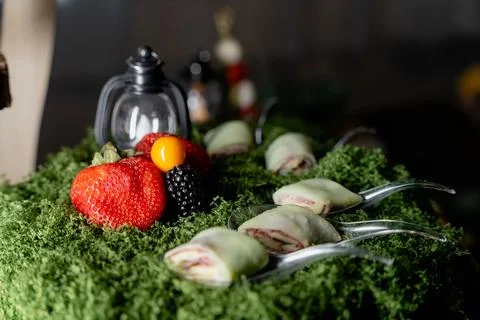Forest style table setting using moss and green leaves Stock Photos