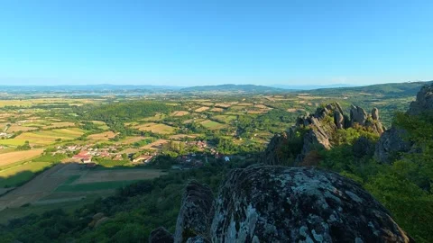 Forest trail leads to vast, sunlit valley. Boracki krs Serbia 動画素材 345004392