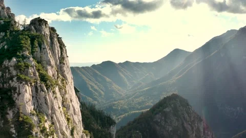 Forest Valley Between Alps With The Sun Rays Breaking Through the Clouds. Stock Footage 168498038