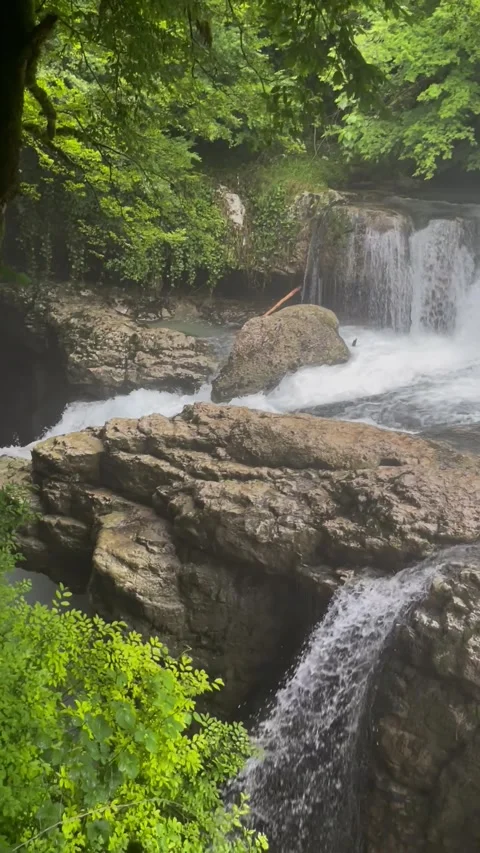 Forest Waterfall Cascading Over Rocks Stock Footage 304884097