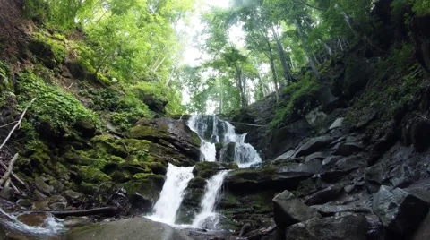 Forest waterfall on the rocks pure bottom view Stock Footage 45385192