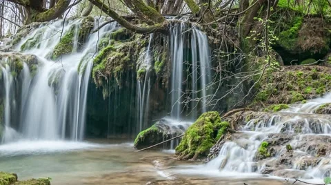 Forest waterfalls on crystal clear mountain river. Easy zoom out Stock Footage 62967115
