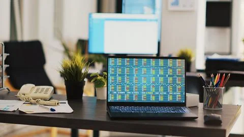 Forex analytics on notebook screen in company workplace Stock Photos