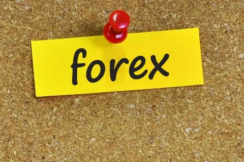 Forex  word on notes paper with cork background Foto stock