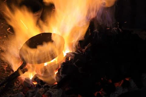 Forge fire in blacksmith's where iron tools are crafted Stock Photos