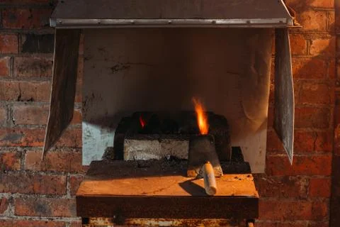 Forge fire Forge fire used for creating iron tools in blacksmith's Stock Photos