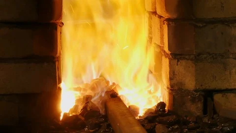 Forge fire in furnace. Blacksmith temper a steel product in a stove. Smithy f Stock Footage 121583768