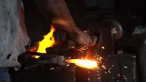Forge iron at the blacksmith Stock Footage 266920627