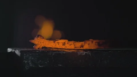 Forge workshop. Smithy manual production. Hands of smith with hammer hit on Stock Footage 117246035