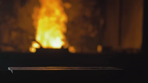 Forge workshop. Smithy manual production. Hands of smith with hammer hit on Stock Footage 120665693