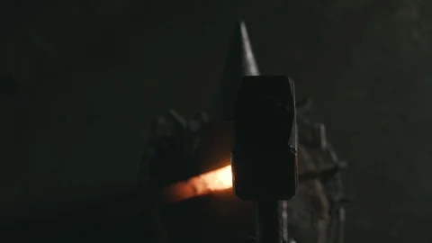 Forge workshop. Smithy manual production. Hands of smith with hammer hit on Vídeo Stock 121123392