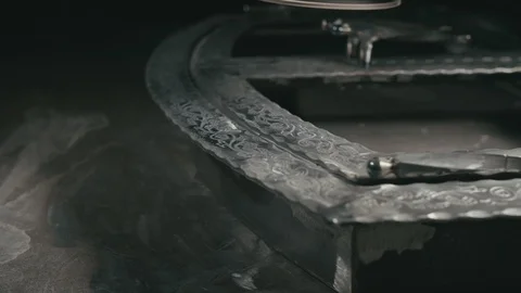 Forge workshop. Smithy manual production. Polish metal with an angle grinder Stock Footage 121939116