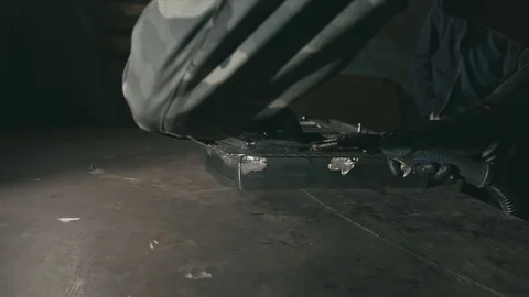 Forge workshop. Smithy. Worker in a welding hood helmet welds a part by electric Stock Footage 121300278