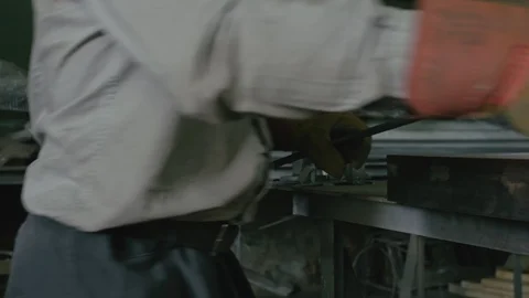 Forge workshop on table. Smithy manual production. Work on the product. Ruler Stock Footage 120755334