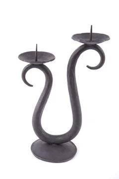 Forged candlestick on a white background 스톡 사진