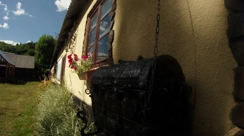 Forged chest under the historic building forge working under the blue sky Stock Footage 46417082
