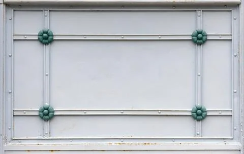 Forged decor with rectangle frame and green flowers 스톡 사진