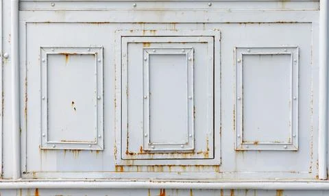 Forged decor with rectangle frames  on a white steel wall 스톡 사진