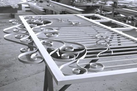 Forged gate design. Stock Photos