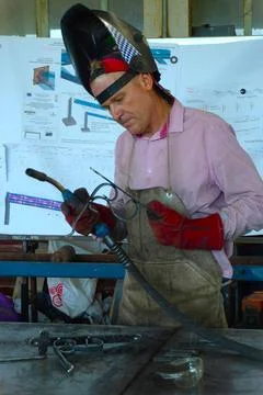 Forged gates created by a master. Stock-Fotos