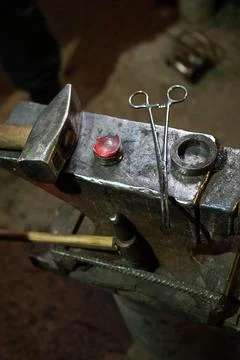 Forging in a forge with metal tools Stock Photos