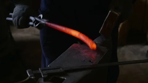 Forging hot metal in smithy Stock Footage 78894108