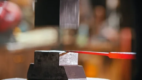 Forging industry - making a knife under the pressure machine Stock Footage 126206512